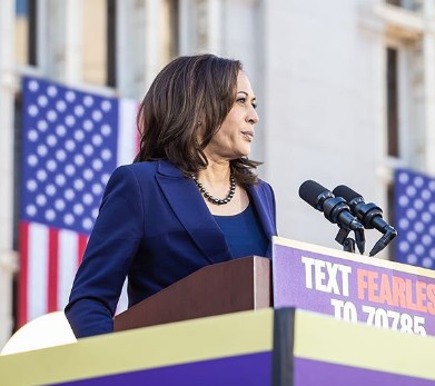 Kamala Harris in a podium for speech.